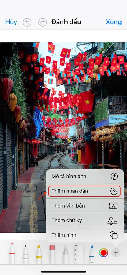 cách đổi phông nền ảnh trên iphone-Mở tính năng thêm nhãn dán 02