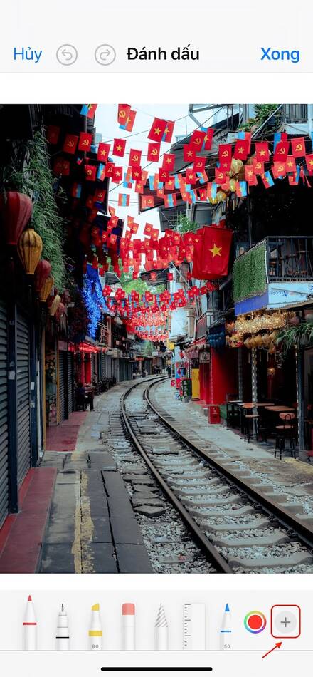 cách đổi phông nền ảnh trên iphone-Mở tính năng thêm nhãn dán 01