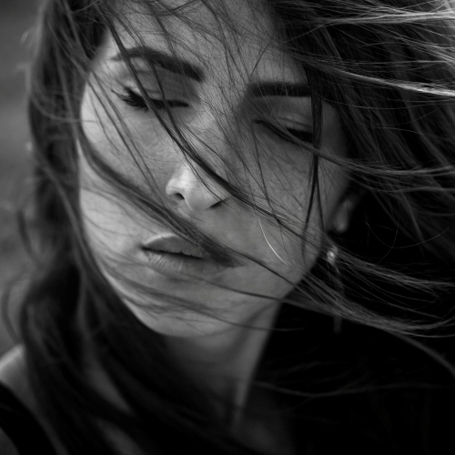 remove people from photos - b&w woman with watermark after